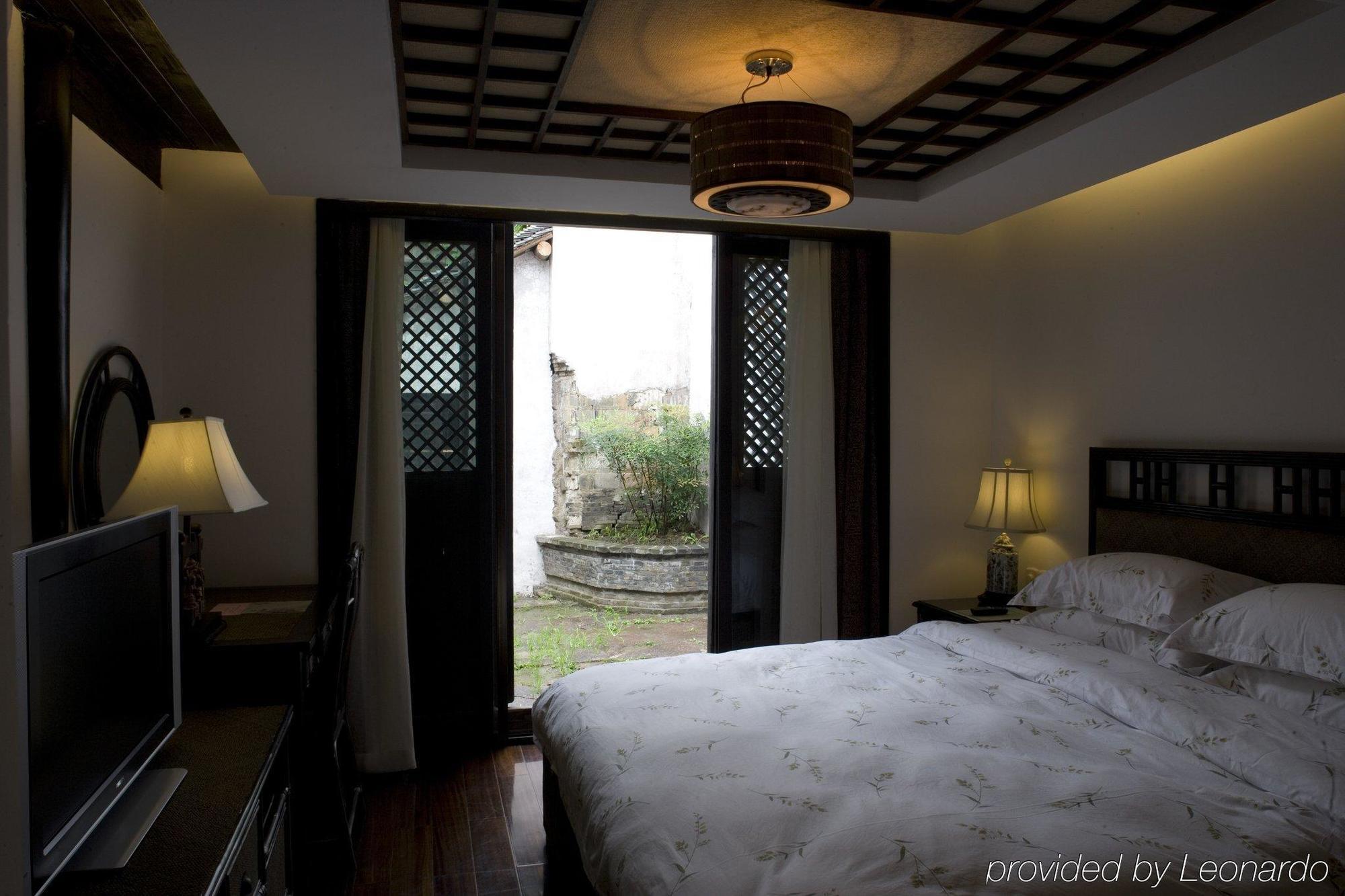 Wuzhen Clubhouse Hotel Jiaxing Room photo