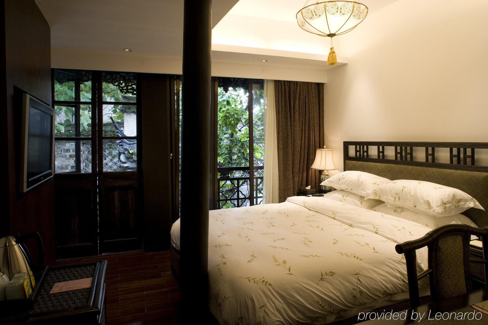Wuzhen Clubhouse Hotel Jiaxing Room photo
