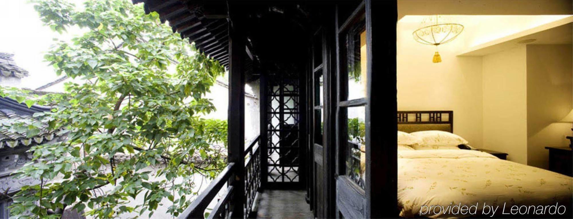 Wuzhen Clubhouse Hotel Jiaxing Room photo